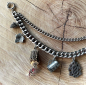 Preview: 1 Lederhosen-Charivari zweireihig, 9 Anhänger, antik-silberfarben, ca. 33 cm