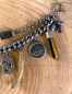 Preview: 1 Lederhosen-Charivari, zweireihig, 11 Anhänger, antik-silberfarben, ca. 30 cm