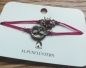 Preview: Armband-Set, pinkes Stoffband mit Edelweiß und Breze in bronzefarben