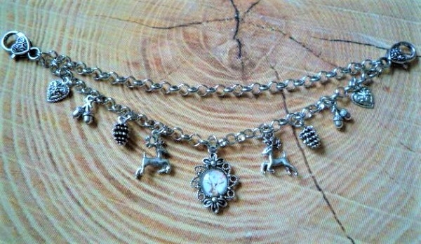 2-reihiges Charivari mit 9 Anhängern, antik-silberfarben, ca. 22 cm