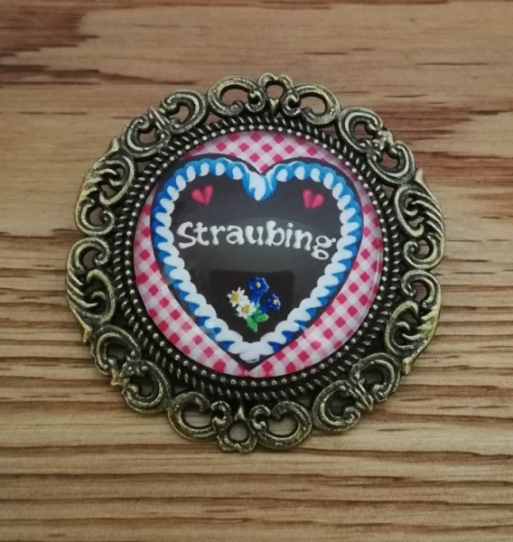 1 Brosche, "Lebkuchenherz Straubing", bronzefarben