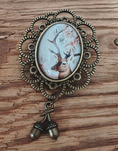 1 ovale Trachtenbrosche, "Hirschkopf", antik-bronzefarben